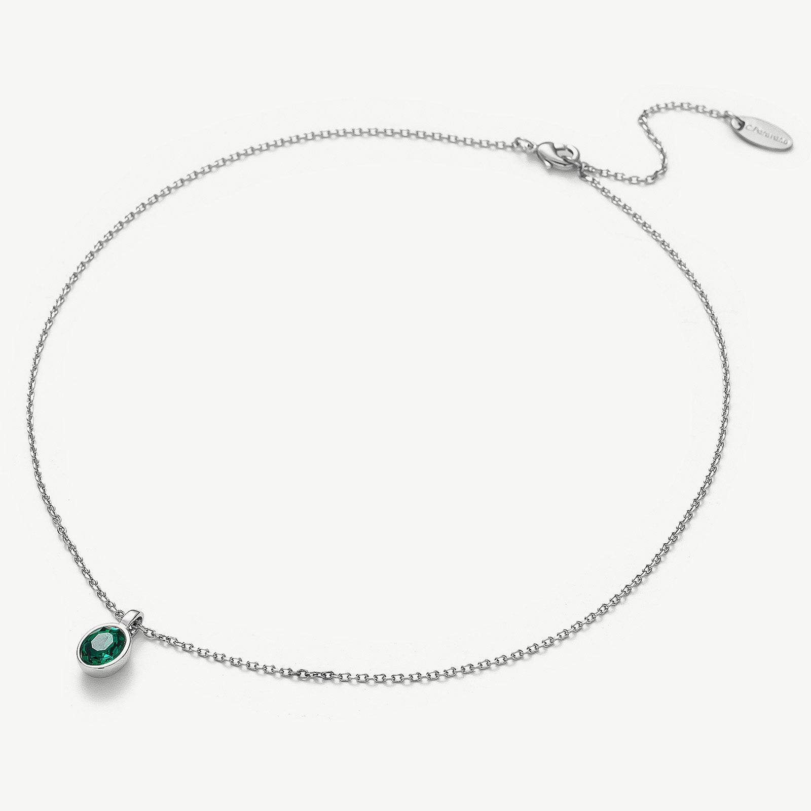 Agate Pendant Necklace in Emerald, a lush emerald charm captured in an agate pendant, creating a stylish and timeless accessory to add a pop of color to your ensemble