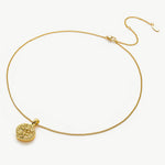 Stylish Disc Pendant Necklace, showcasing radiant hammered gold, this necklace features a textured disc pendant on a delicate chain, creating a refined and versatile accessory for any occasion