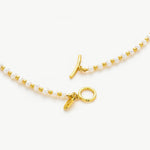 Gold Pearl Beaded Necklace, exuding luxurious sparkle, this necklace features a strand of dazzling pearls intermingled with golden beads for a glamorous and captivating look