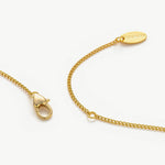 Gold Hammered Disc Necklace, a handmade and chic accessory, featuring a lustrous hammered gold disc pendant suspended from a dainty chain, adding a touch of modern flair to your ensemble