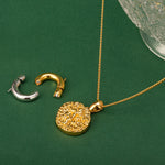 Gold Hammered Disc Necklace, a versatile disc charm to elevate your style, featuring a minimalist hammered gold disc pendant on a delicate chain, adding a touch of understated charm to your neckline.