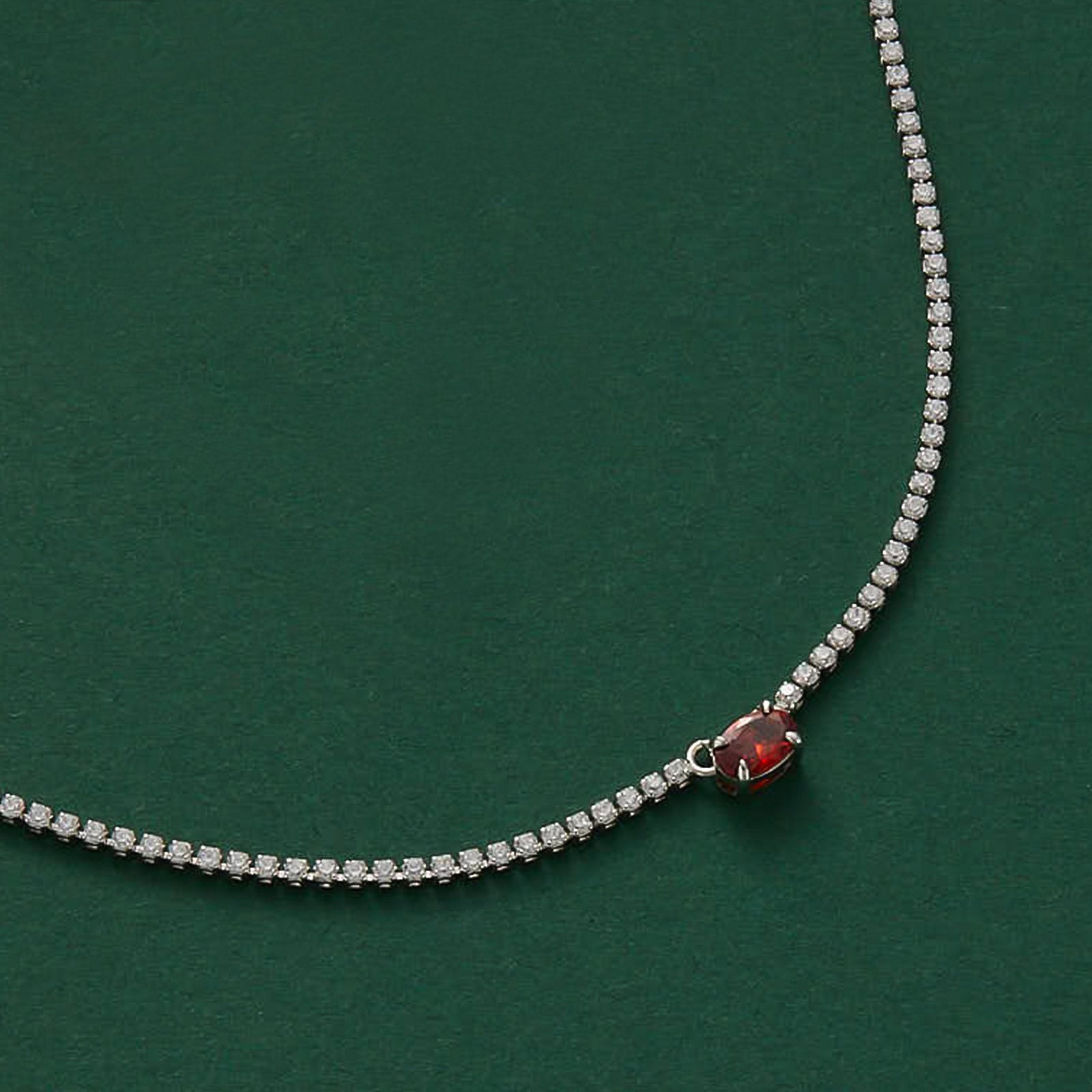 Emerald Rectangle Dewdrop Pendant, a sleek and radiant addition to your jewelry collection, showcasing an emerald rectangle dewdrop on a delicate chain, adding a touch of sophistication to your look