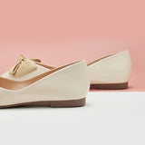 Step into sophistication with these timeless white eather square-toe flats, complete with a graceful bowknot accent for a classic and versatile footwear choice.