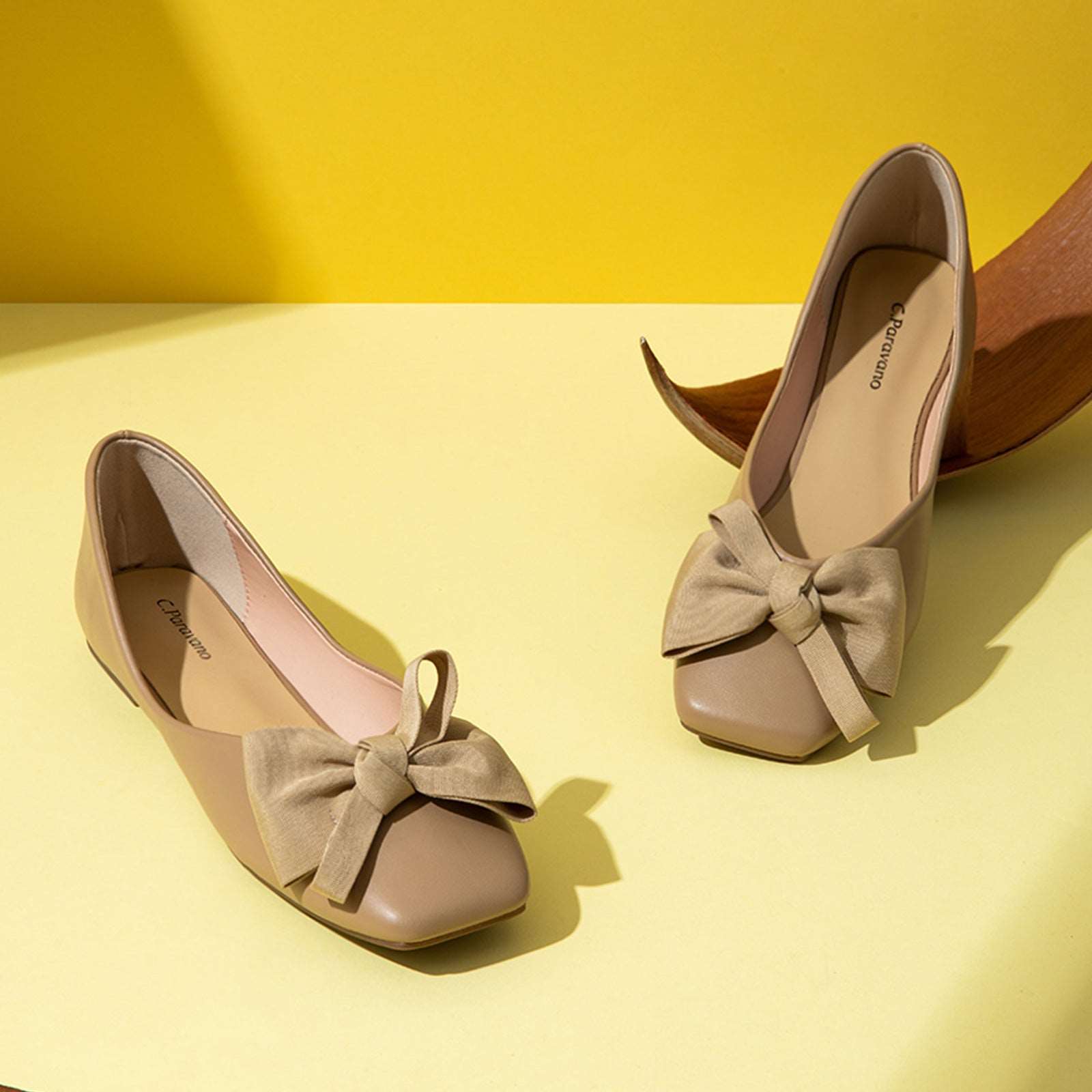 Soft Beige Bowknot Flats: Step into comfort and style with these soft beige square-toe flats, showcasing a delicate bowknot detail and crafted in soft leather for a versatile and polished appearance