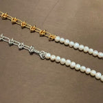 Molten Baroque Pearl Twisted Chain Bracelet, dynamically designed for pearlescent harmony, this bracelet creates a harmonious blend of twisted platinum chains and baroque pearls, offering a chic and eye-catching accessory