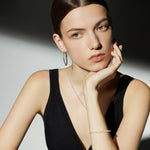 Pearl Crystal Chain Bracelet, dynamically designed for pearlescent harmony, this bracelet creates a harmonious blend of platinum chain, pearls, and crystals, offering a chic and eye-catching accessory