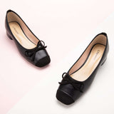 Elevate your style with these black bowknot low heels, offering a perfect blend of comfort and timeless fashion.