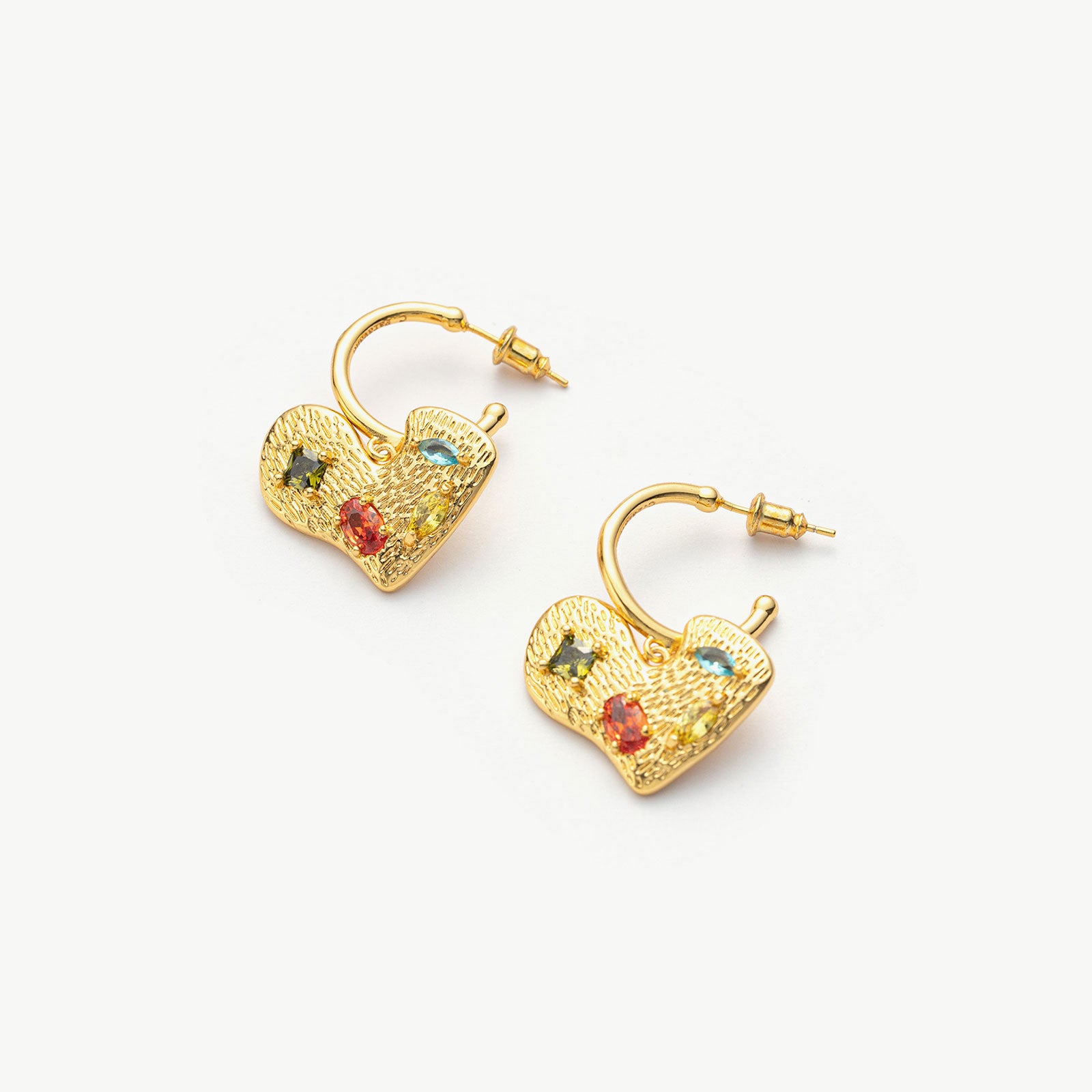 Hoop Earrings adorned with heart-shaped gemstone charms, a versatile and chic pair that effortlessly complements a range of outfits