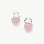 Shining Heart Hoop Earrings in Pink, radiating with radiant charm, these hoops feature heart shapes in a delightful shade of pink for a romantic and luminous look