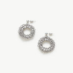 Flower Entwine Earrings, capturing the essence of a whimsical bloom, these earrings bring a touch of nature-inspired charm to your ear ensemble with their intricate floral design.