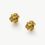 Pearl Coiled Stud Earrings, a classic and sophisticated pair that exudes timeless beauty and grace.