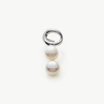 Silver Pearl Ear Cuff, a modern and stylish accessory that adds a touch of sophistication to your ear