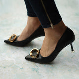 Edgy Minimalism: Women Pumps in Black with distinctive metal buckles, a chic and minimalist addition to your footwear collection
