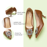 Step into timeless elegance with these brown pumps featuring crystal embellishments and a stylish buckle, perfect for a polished and refined look