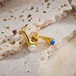 Pearl Crossover Hoop Earrings, creating a cascade of pearls in a crossover arrangement, offering a graceful and eye-catching adornment to your ears