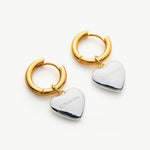 Heart Tunnel Hoop Earrings, a romantic and revolving design that captures attention with intricate heart-shaped details