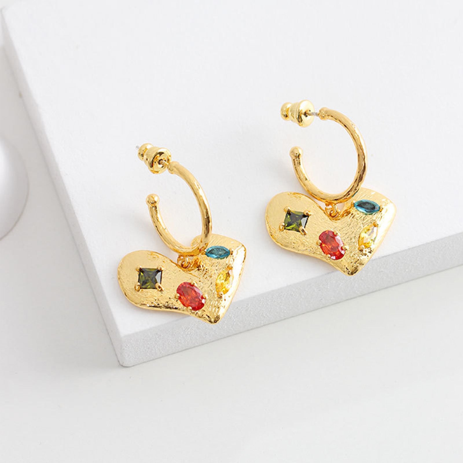 Heart Gemstone Charm Hoop Earrings, a playful and radiant addition to your jewelry collection, featuring colorful gemstones in a chic hoop setting