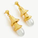Pearl Drop Earrings in Gold making sculptural statements with their gold design, these earrings add a touch of refined charm and elevate your style with their timeless beauty