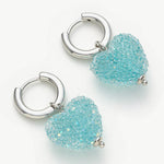 Heart Hoop Earrings in Azure Blue, showcasing an affectionate and stylish combination of heart shapes and azure blue tones, perfect for a unique and vibrant appearance
