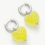 Heart Hoop Earrings in Lemonade Yellow, exuding whimsical charm with heart-shaped hoops in a playful and refreshing yellow hue for a delightful appearance