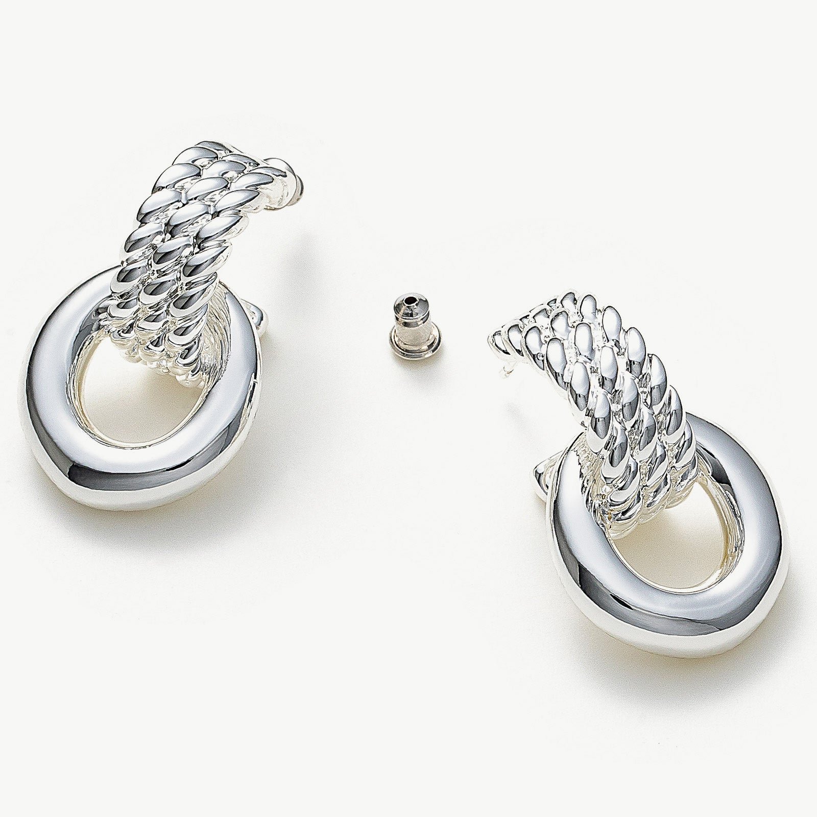 Ring Entwine Chunky Earrings, showcasing a modern twist with silver entwined rings, these earrings bring a touch of contemporary style to your overall look