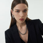 Ring Entwine Chunky Earrings featuring radiant silver circlets, these hoops offer a dynamic and eye-catching accessory, perfect for a bold and stylish look.