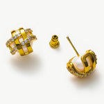 Pearl Coiled Stud Earrings, a versatile and chic pair that effortlessly complements both casual and formal ensembles