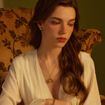 Pearl Coiled Stud Earrings, a stylish and contemporary choice for elevating your look with understated glamour