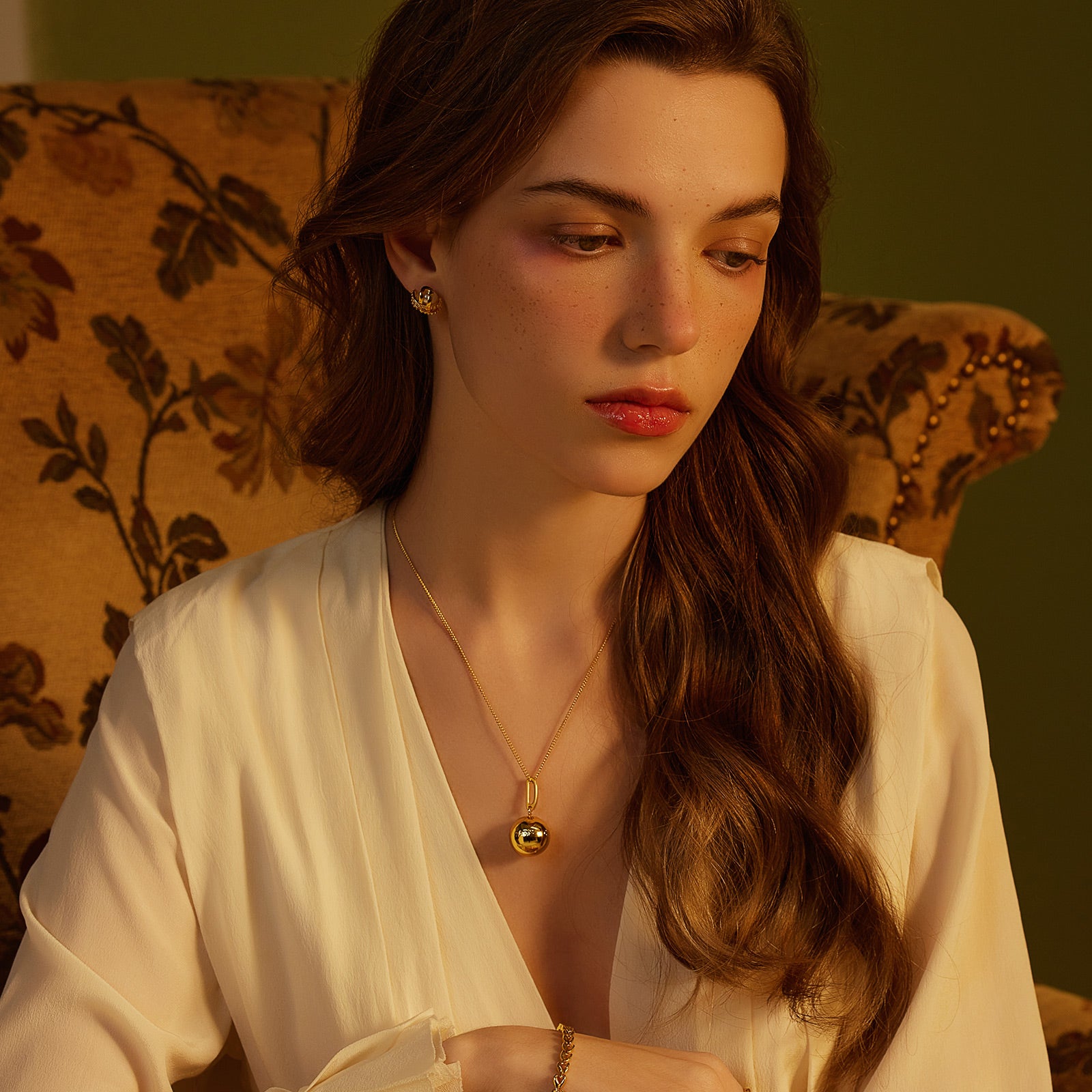 Pearl Coiled Stud Earrings, a stylish and contemporary choice for elevating your look with understated glamour