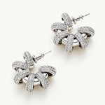 Coiled Single Earrings making an artistic statement with their coiled design, these earrings capture attention and bring a contemporary flair to your style.