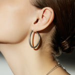 Hoop Earrings with a front-facing flair, a bold and unique style statement that captures attention with its distinctive and eye-catching design