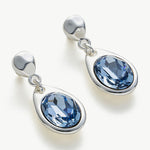 Large Dove Grey Crystal Drop Hoops with sculpted crystal adornments, these earrings provide a unique and artistic charm, elevating your style with their eye-catching design.