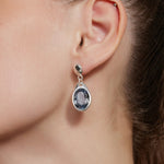 Large Dove Grey Crystal Drop Hoops with a cascade of crystals, these earrings bring a glamorous and sparkling element to your ensemble, making a bold fashion statement