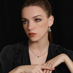 Large Dove Grey Crystal Drop Hoops, exuding chic elegance with the dove grey hue and crystal drops, these hoops offer a stylish and versatile accessory for your wardrobe