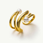 Claw Pearl Ear Cuff in gold, a timeless and versatile accessory that effortlessly complements any ensemble