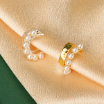 Gold Pearl Ear Cuff, a chic and contemporary choice that elevates your ear with a hint of golden elegance