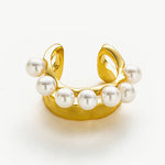 Pearl Ear Cuff in gold, a gleaming and stylish piece that enhances your look with a warm and luminous glow