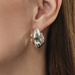 Sculpted Ridge Accents: Ridge Hoop Earrings with sculpted ridge accents, these hoops make a bold and artistic statement, capturing attention with their unique and eye-catching design