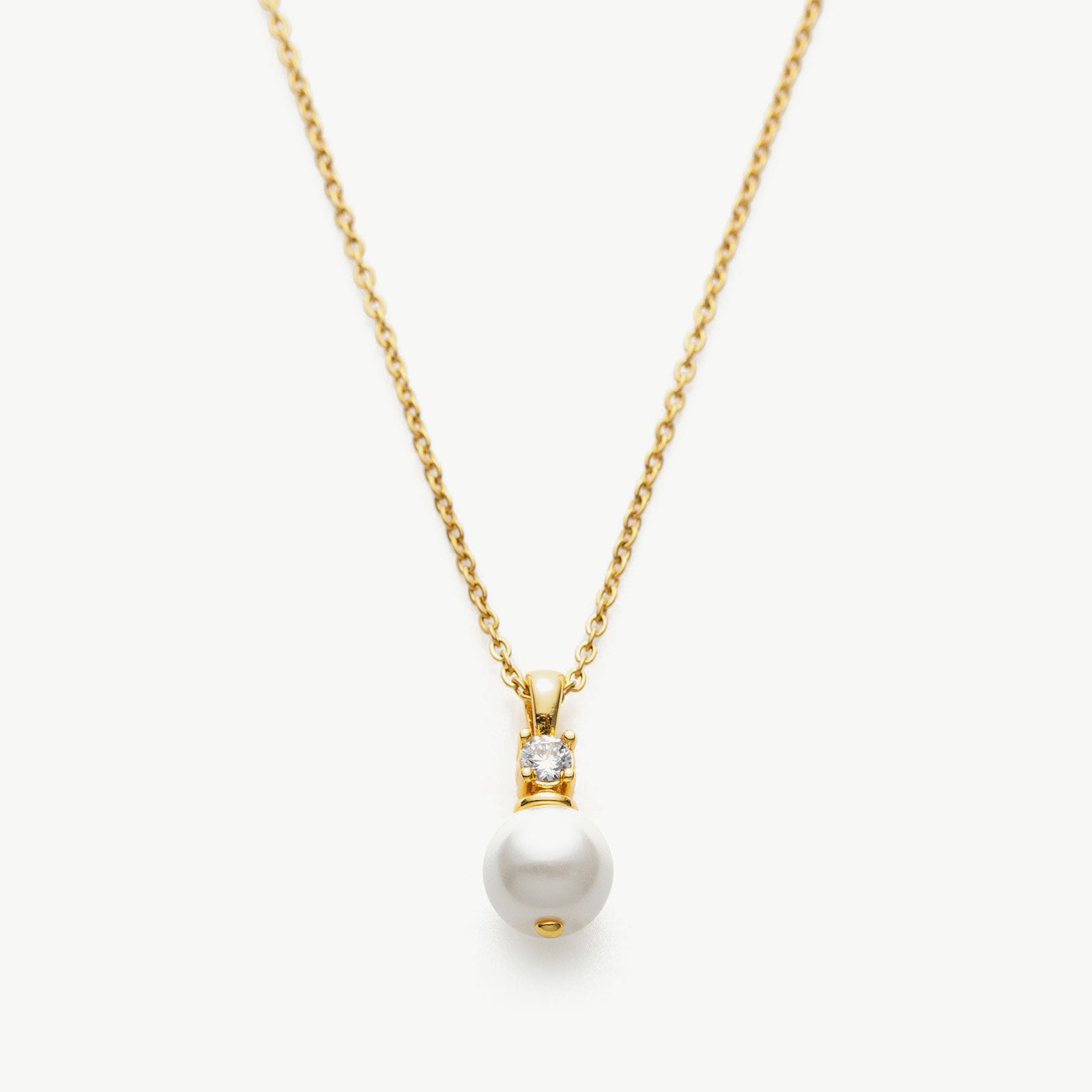 Pearl Drop Pendant Necklace in Gold, showcasing a timeless gold pendant with a lustrous pearl, adding a touch of elegance and sophistication to your neckline.