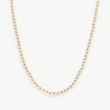 Gold Stone Beaded Necklace, a timeless piece featuring a strand of lustrous beads in golden hues, creating an opulent and elegant accessory for a touch of sophistication