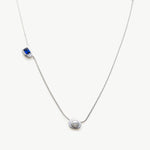 Platinum Crystal Drop Necklace with a captivating spinel purple crystal pendant, showcasing a royal and radiant design on a platinum chain, adding a touch of glamour and sophistication to your ensemble.