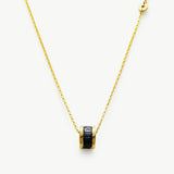 Black Ring Pendant Chain Necklace, a chic and versatile piece with a bold contrast, featuring a black ring pendant suspended from a delicate chain, adding a touch of modern sophistication to your neckline