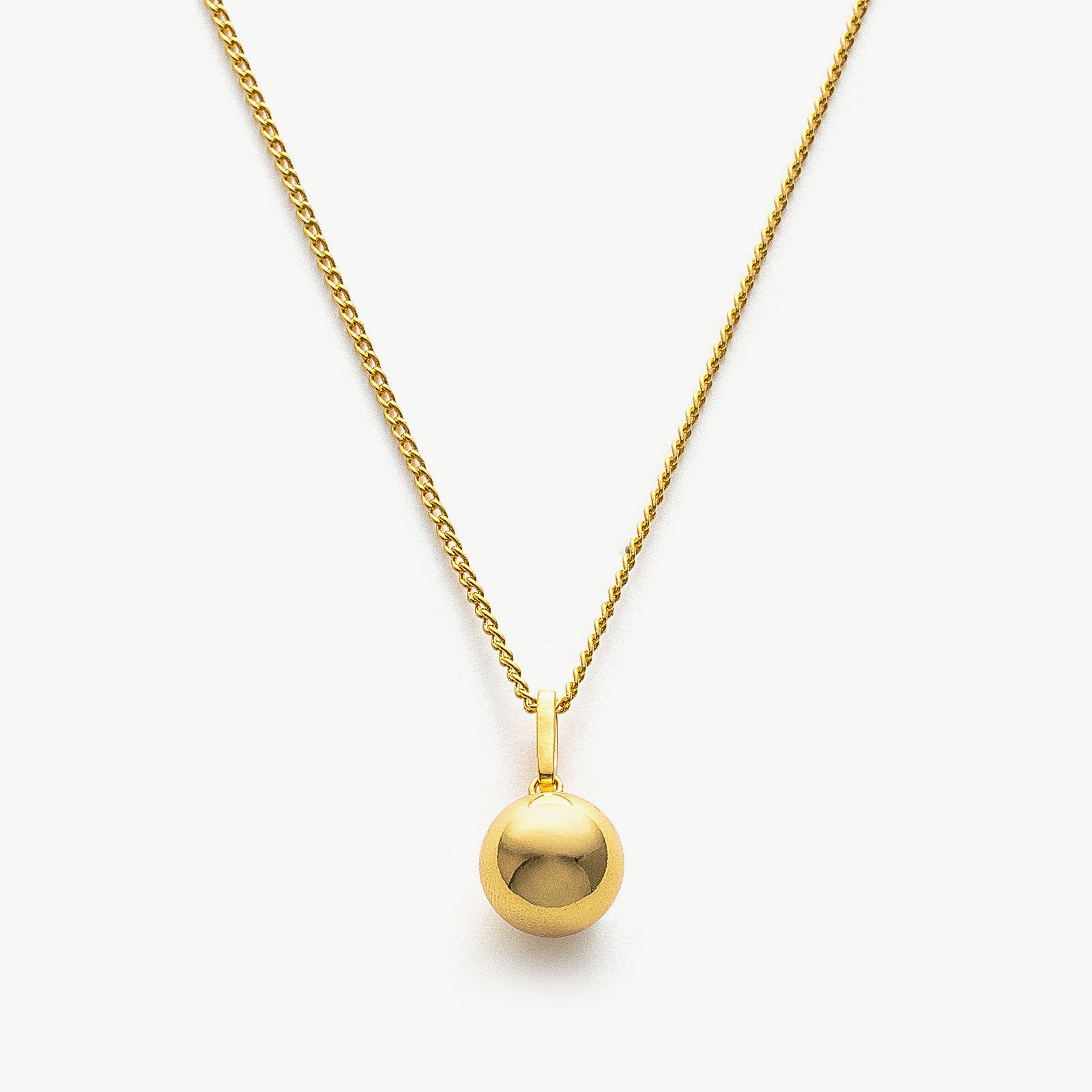 Sphere Pendant Chain Necklace, a symbol of modern minimalism, featuring a sleek and polished sphere pendant suspended from a delicate chain, adding a touch of contemporary elegance to your neckline
