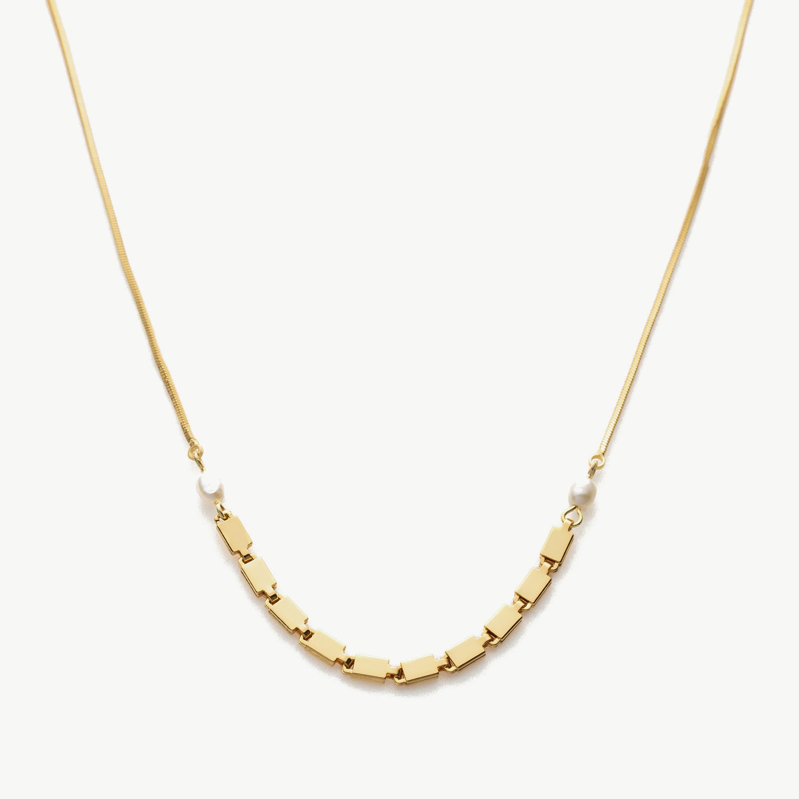 Pearl Chain Necklace, a timeless piece featuring a delicate chain adorned with lustrous pearls, adding a touch of elegance and sophistication to your neckline