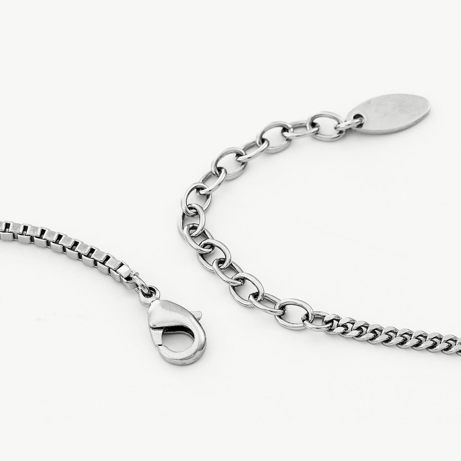Pearl Chain Necklace, a versatile pearl accent to elevate your style, featuring a delicate chain adorned with pearls, adding a touch of modern flair to your neckline.