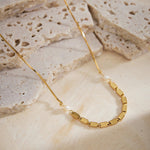 Pearl Chain Necklace, symbolizing opulent pearl beauty, this necklace features a string of captivating pearls suspended from a delicate chain