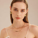 Pearl Chain Necklace, a chic pearl accent that enhances your style, featuring a stylish chain adorned with classic pearls for a timeless and fashionable statement.