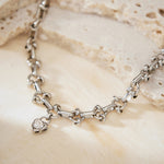 Platinum Heart Diamond Necklace, embodying platinum romance, this necklace features a chain of intricately crafted hearts adorned with diamonds, creating a stunning and romantic accessory for expressing love and style.