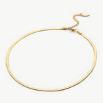 Snake Chain Necklace, exuding a slinky and sparkling charm, this necklace features a serpent-inspired chain that catches the light for a glamorous and eye-catching effect