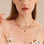 Multi Gemstone Pearl Necklace, a chic fusion of various gemstones and pearls in a trendy arrangement, creating a versatile accessory that complements both casual and formal looks.